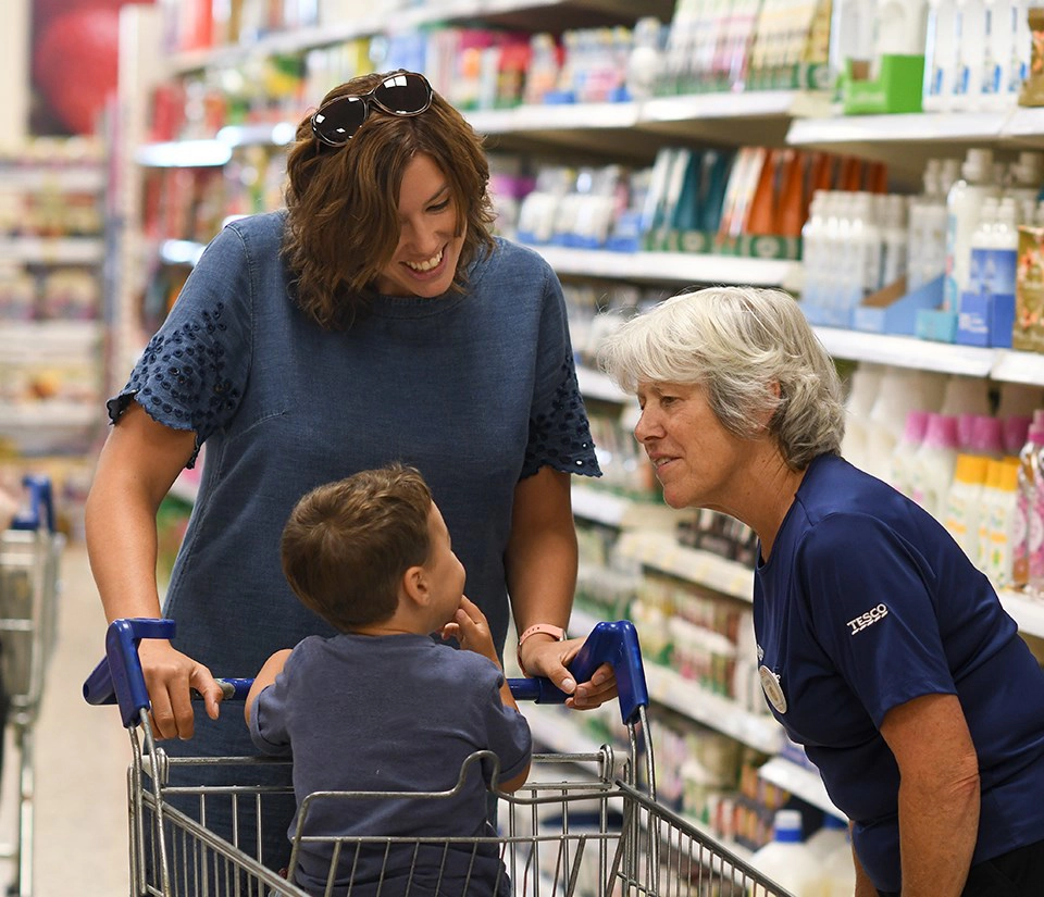 Shoppers w/ Tesco Employee